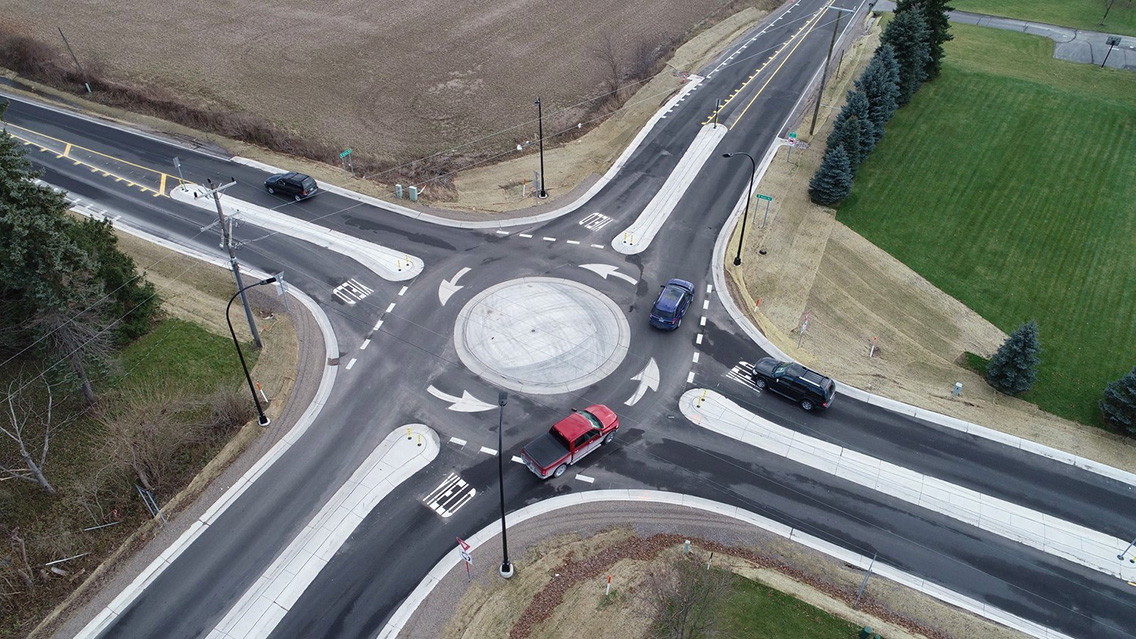 Mini-roundabout at the intersection of Moon Road and Bemis Road in Saline, Michigan.
