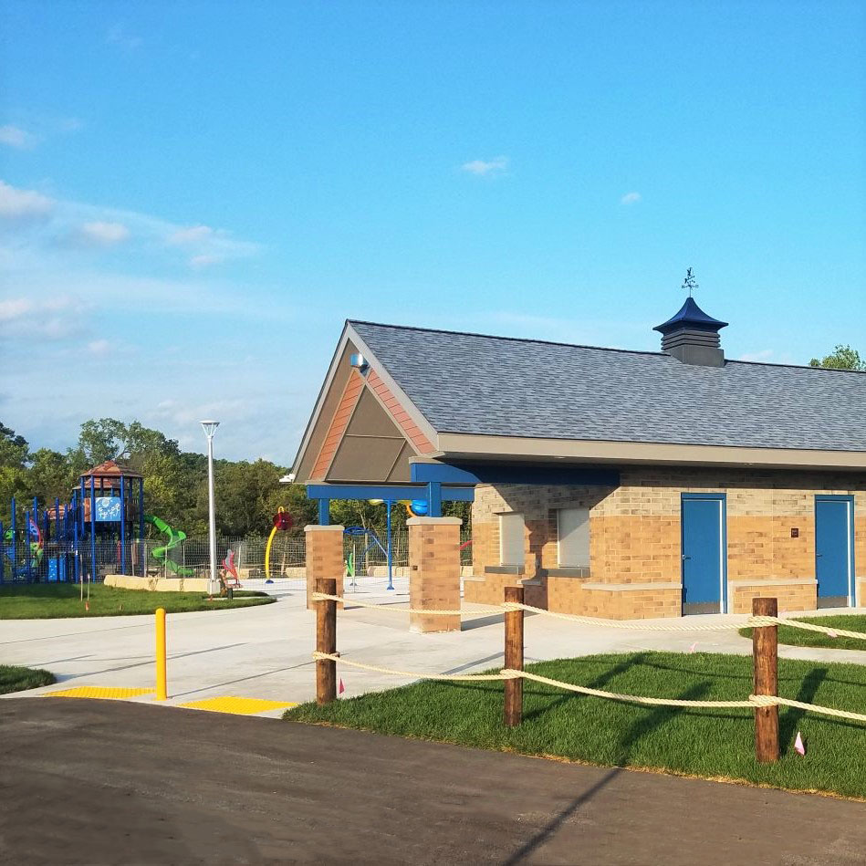 New ADA compliant restroom and concession building with new splash pad and playground at Sauk City Riverfront Park in Sauk City, Wisconsin - project by MSA Professional Services