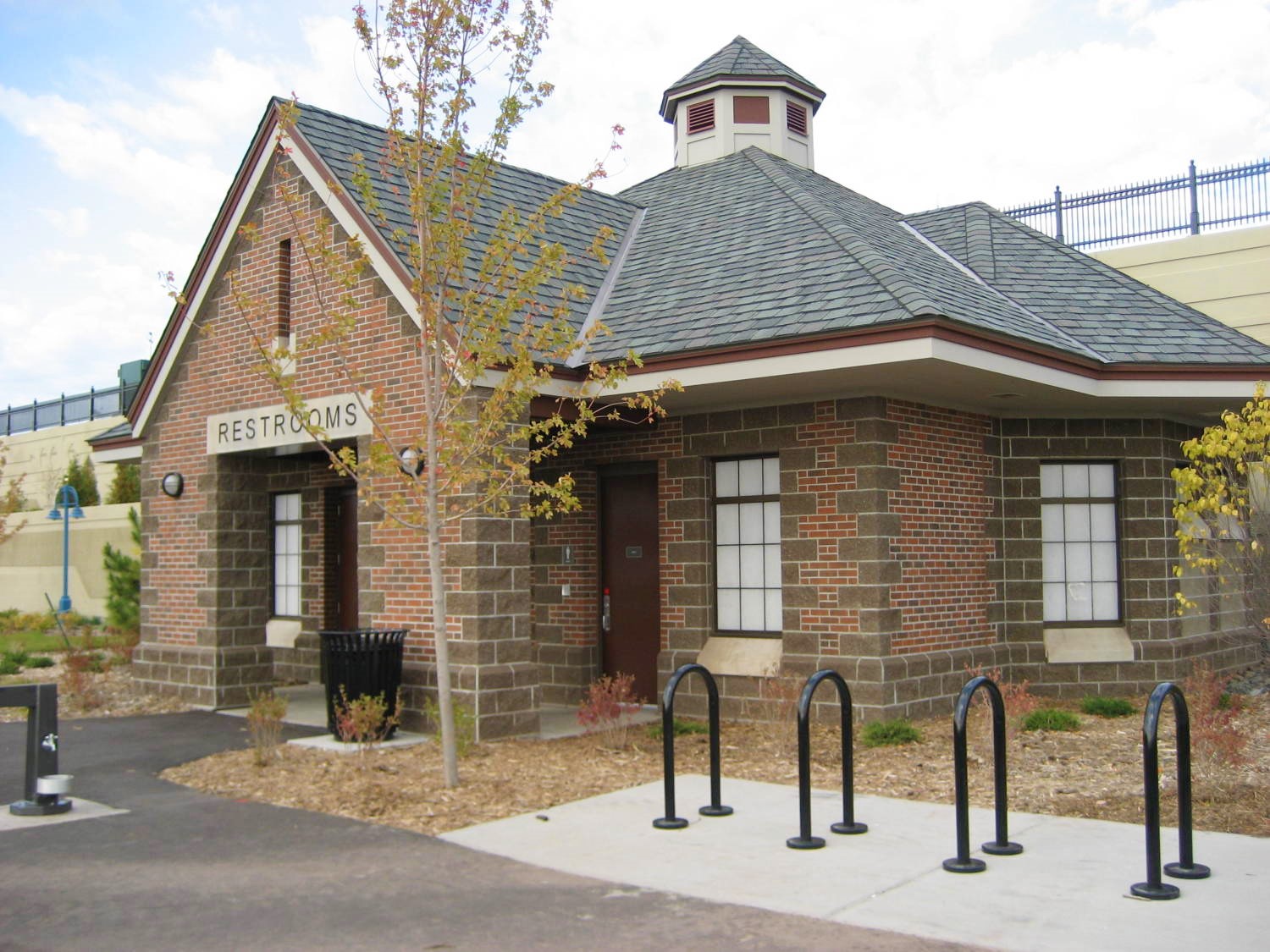 New architectural brick restroom building in the heart of Duluth, Minnesota, provides a railroad aesthetic and nice stop along the popular lakewalk.