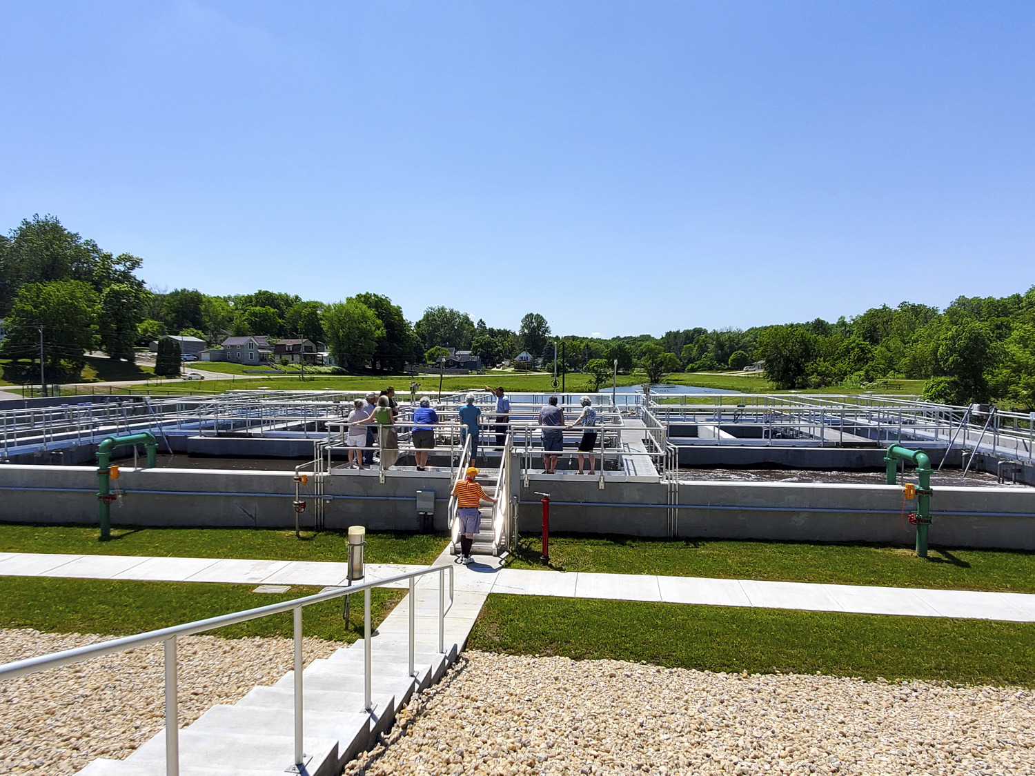 Visitors enjoy a tour at the new wastewater treatment facility in Mount Carroll, Illinois.