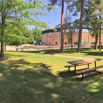 Master planning for Carson Park in Eau Claire, Wisconsin, retains large pine trees and the Carson Park Baseball Stadium, once home to Hank Aaron.