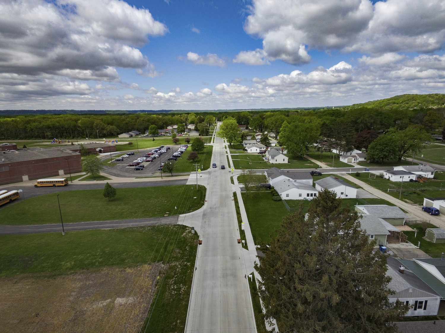 Drone photograph of reconstructed Wacker Road in Savanna, Illinois, with improved surface, ADA compliance, school access and utilities.