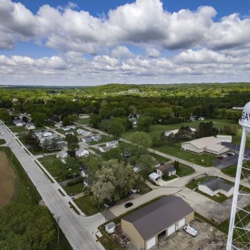 Drone photograph of reconstructed Wacker Road in Savanna, Illinois, with improved surface, ADA compliance, school access and utilities.