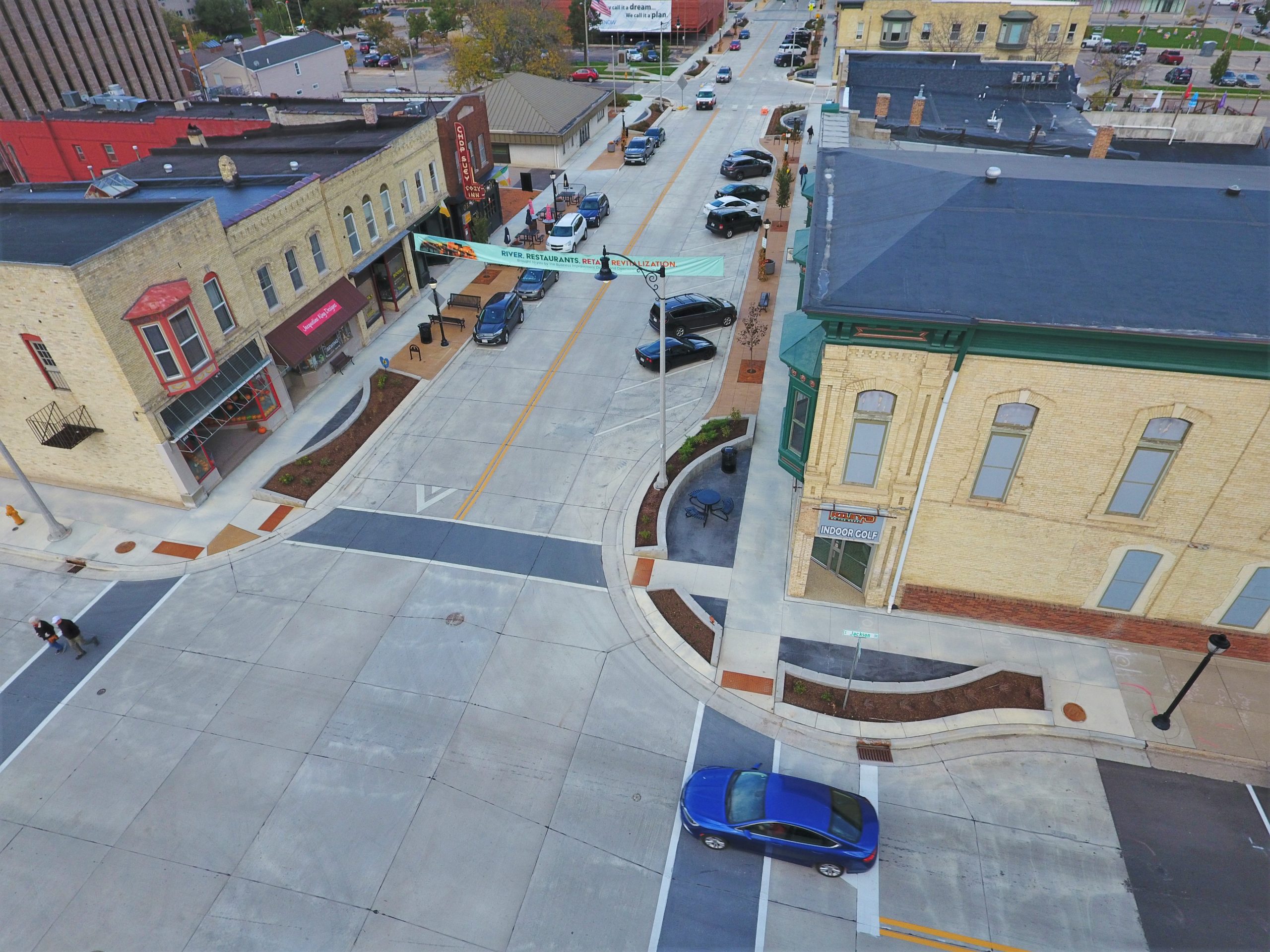 View of elegant C-shaped raised concrete planters as part of the reconstruction of West Milwaukee Street in downtown Janesville, Wisconsin.