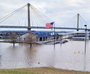 Image of flooded docks, boats and marina facilities after a major flooding event in Alton, Illinois.