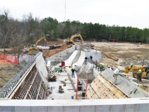 Construction of a new dam in Lake Delton, Wisconsin, after a devastating flooding event 