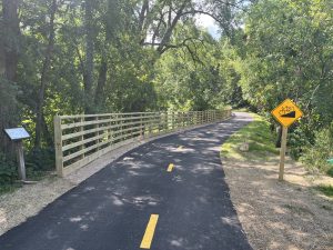 New ADA-compliant multiuse path along Pheasant Branch Creek in Middleton Wisconsin, completed as part of a flood restoration project by MSA Professional Services. 