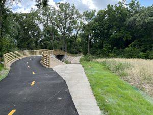 Newly reconstructed pedestrian bridge and at-grade ford of Pheasant Branch Creek in Middleton Wisconsin as part of flood restoration efforts by MSA Professional Services. 