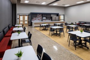 Photograph of a small modern cafe inside the Visability Center in West Allis, Wisconsin, a work place created for individuals with vision impairments. 
