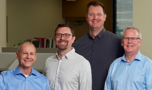 Image of Randy All, Nick Wagner, Jason Testin and Gil Hantzsch, four executives representing the acquisition of Fredericksen Engineering of Mequon, Wisconsin, by MSA Professional Services, Inc. on July 10, 2023.