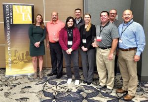 Group photo of professional planners from MSA and representative from the City of Waverly Iowa after receiving the 2023 Best Practice Award from the American Planning Association of Iowa. 