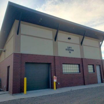 Exterior photo of new lift station in the City of Duluth, Minnesota, designed to complement and collaborate with the MNDOT's massive Twin Ports Interchange project in 2023.